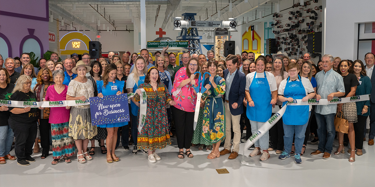 Hundreds attend the ribbon-cutting ceremony at the opening of the museum.