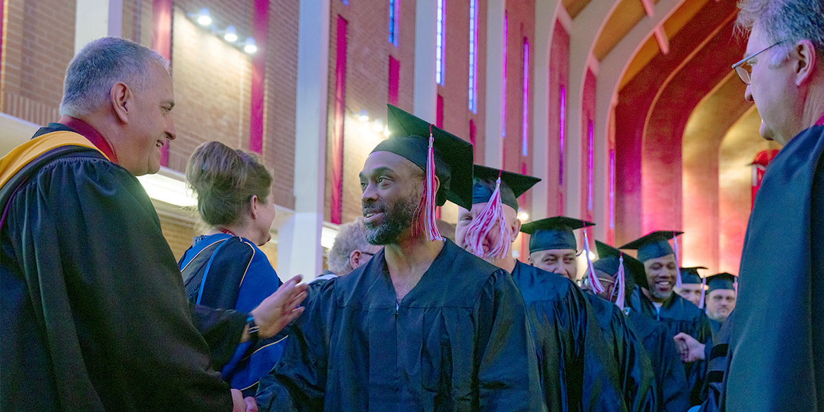 Graduates process at the commencement ceremonies