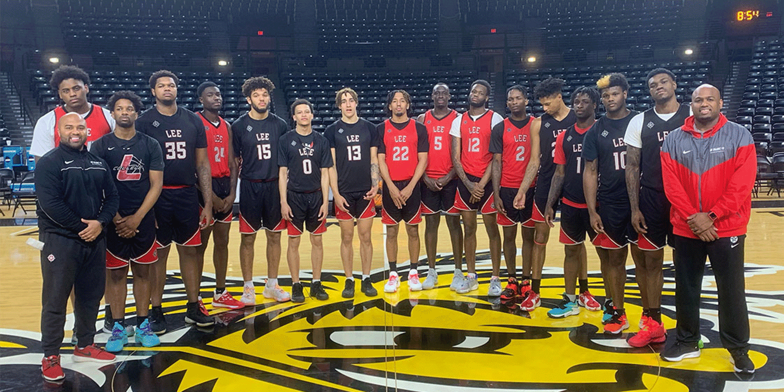 The Lee College Runnin' Rebels pose on the court