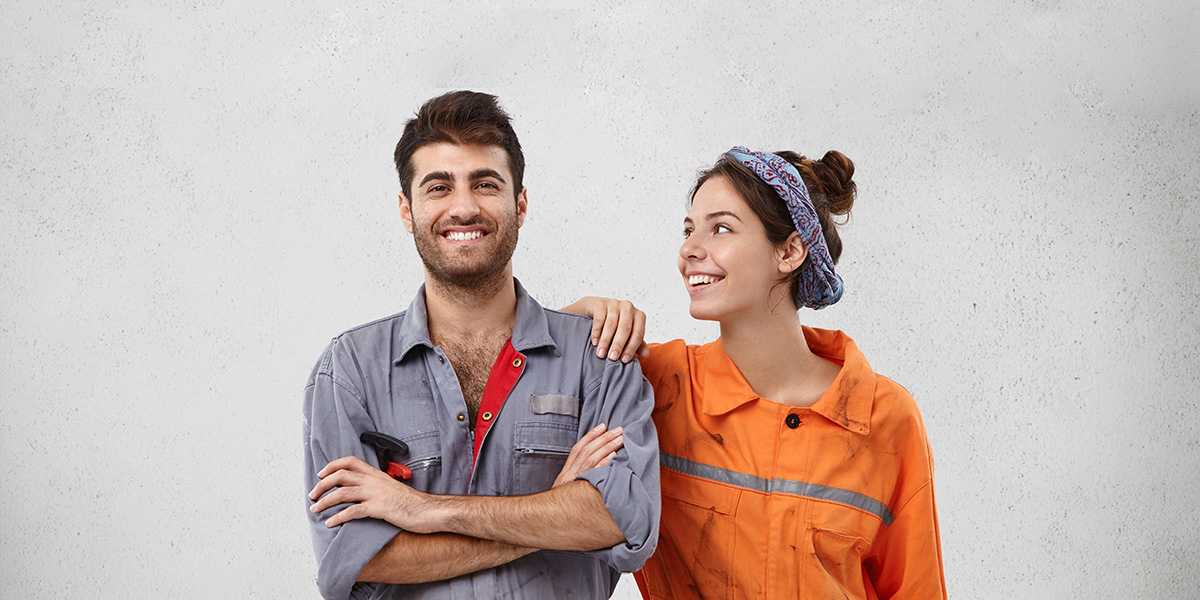 Two smiling electricians