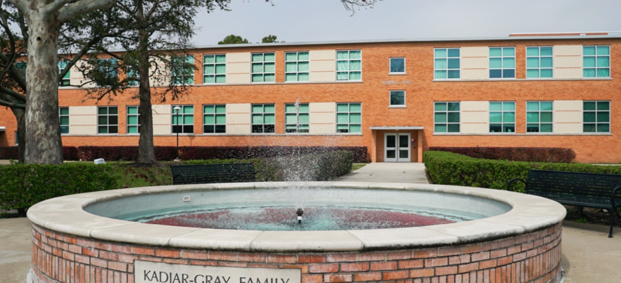 The back of Rundell Hall, with the Kadjar-Gray Family Fountain in the foreground