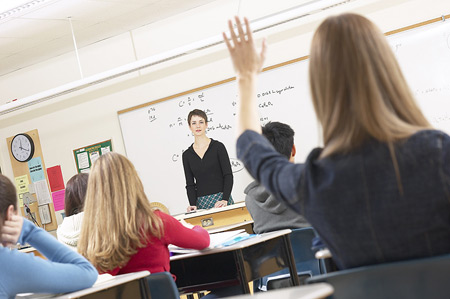 Students in class answering questions